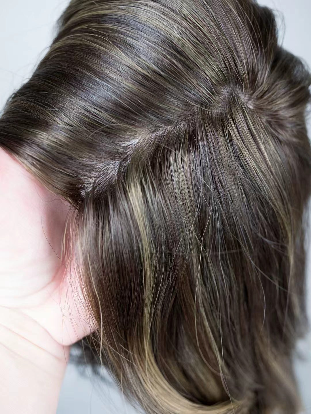 TESS brunette highlights and side parting detail